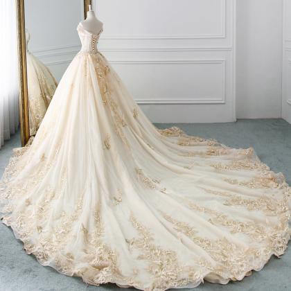 Luxury Fashion Champagne Wedding Dress Bridal Gown..