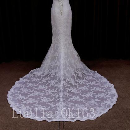 Sleeveless Lace Mermaid Wedding Dress Featuring..