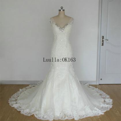 V-neck Lace Beaded Mermaid Wedding Dress Featuring..
