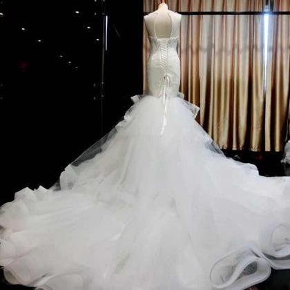 Sleeveless Sheer Sweetheart Mermaid Wedding Dress..