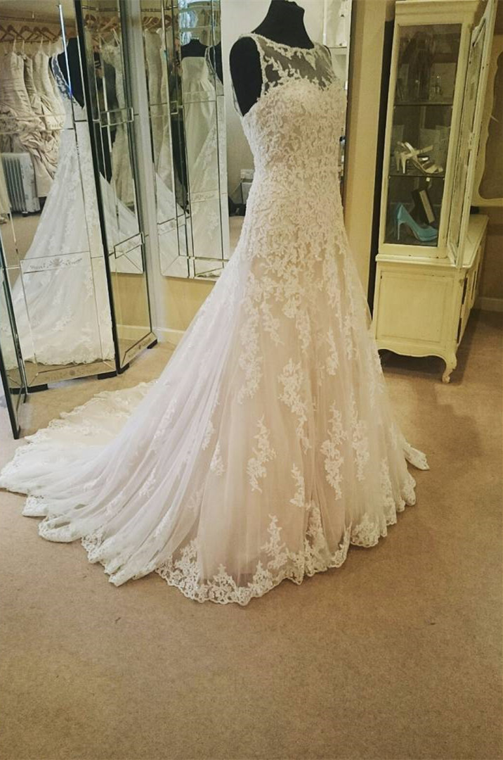 Sheer Sleeveless Lace Appliqués A-line Wedding Dress With Long Train And V-back